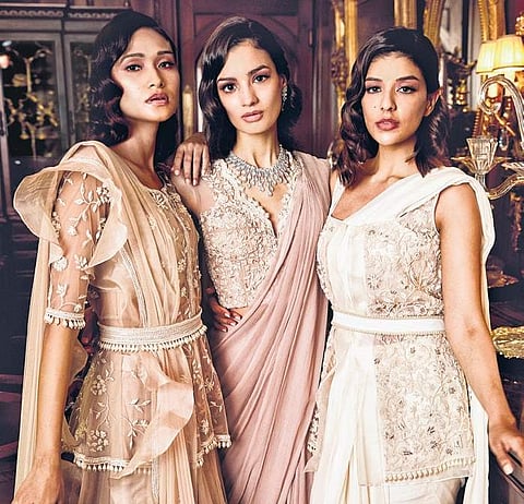 Models wearing silhouettes from Basra