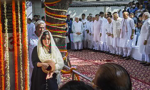 Bansuri Swaraj, daughter of former external affairs minister Sushma Swaraj performs her last rites as Prime Minister Narendra Modi, Union Ministers Rajnath Singh and Amit Shah and others look on at Lodhi crematorium in New Delhi on 7 August 2019. (Photo |