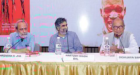 (From Left) Author Dhirendra K. Jha, Hartosh Singh Bal and MP Digvijaya Singh