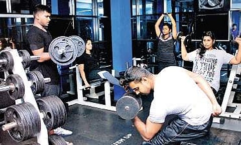Members work out at a gym. (Photo | EPS)