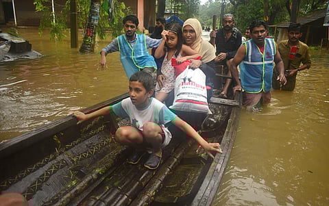 Boats used to evacuate people stranded in the flood water at Thengilakkadavu area in Kozhikode. (Photo | Manu R Mavelil, EPS)