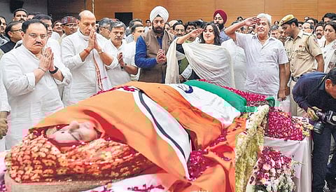 Sushma Swaraj’s daughter and husband pay tribute to her at BJP head office. (Photo | PTI)