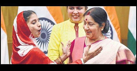 Swaraj, seen here with Geeta, had said the government would take care of her. (Photo | PTI)