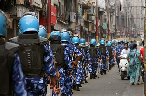 Rapid Action Force RAF personnel patrol a street during restrictions in Jammu. (Photo | PTI)
