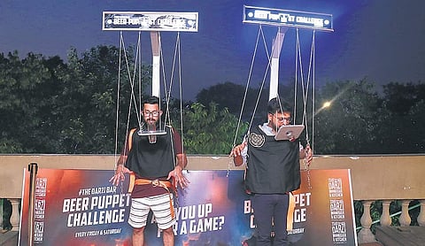 Beer Puppet Challenge at Darzi Kitchen and Bar.