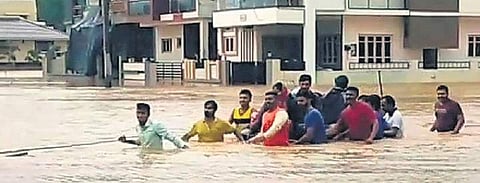 The youths swam about 200m in the flood water to reach the building | express