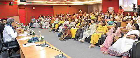 Kapil Dev and Madan Lal at a FICCI FLO session.