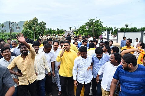 Police stopping TDP general secretary Nara Lokesh during Chalo Atmakur programme at his residence in Undavalli near Vijayawada. (Photo | EPS)