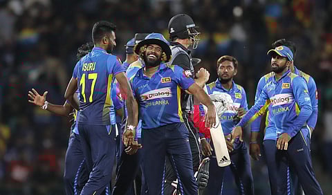 Lasith Malinga celebrates with Sri Lanka teammates. (Photo | AP)