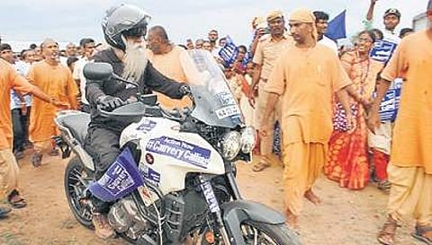 Sadhguru riding motorcycle in Dharmapuri on Wednesday | Express