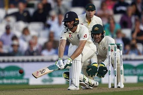 England's Jos Buttler bats during play on the first day of the fifth Ashes cricket Test match between England and Australia at The Oval in London on September 12, 2019. | AFP