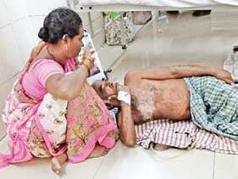 An elderly patient lies on the floor in the fever ward of the Government General Hospital in Vijayawada on Thurday due to lack of beds (File Photo | EPS, Prasant Madugula)