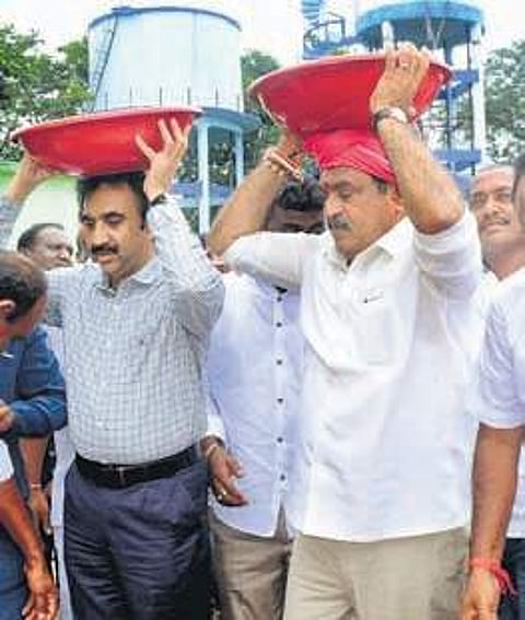 Panchayat Raj Minister Errabelli Dayakar Rao participates in the 30-day action plan initiative at Ktaram village in Bhupalpally on Thursday (Photo |EPS)