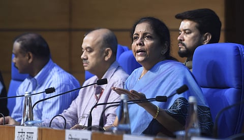 Finance Minister Nirmala Sitharaman with MoS Finance Anurag Thakur and Economic Affairs Secretary Atanu Chakraborty during a press conference in New Delhi (Photo | PTI)
