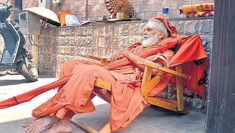 Swami Parameswara Brahmananda Theertha staging a dharna on the path leading up to the Ananthasayi Balasadanam on Saturday | Vincent Pulickal