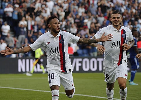 PSG's Neymar, left, celebrates his goal with PSG's Mauro Icardi during the French League One soccer match between Paris Saint Germain and Strasbourg at the Parc des Princes Stadium in Paris, France, Saturday Sept.14, 2019. | AP