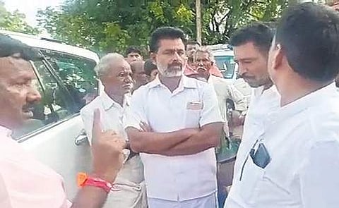 MP A Narayanaswamy argues with the villagers at Pemmanahalli Gollarahatti village in Pavagada taluk on Monday | EXPRESS