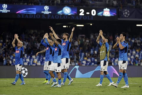 Napoli players celebrate after the Champions League Group E soccer match between Napoli and Liverpool. (Photo | AP)