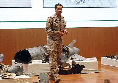Saudi military spokesman Col. Turki al-Malki displays what he describes as an Iranian cruise missile and drones used in an attack during a press conference in Riyadh, Saudi Arabia. (Photo | AP)