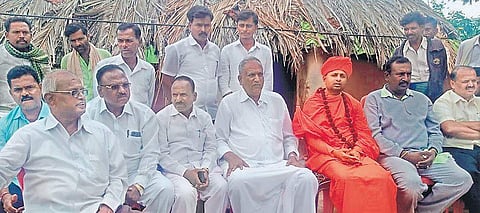 The Golla community members at a meeting held by Sri Krishna Yadavananda Swamiji at Pemmanahalli Gollarahatti hamlet in Pavagada taluk on Tuesday | Express