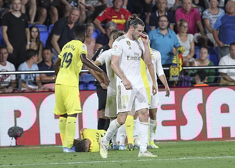 Real Madrid's Gareth Bale leaves the pitch after receiving a red card during the Spanish La Liga soccer match between Villarreal and Real Madrid in the Ceramica stadium in Villarreal, Spain. (Photo | AP)