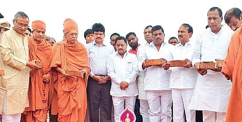 Ministers Etela Rajender and Ch Malla Reddy lay the foundation stone for Asia’s largest stent manufacturing unit in Sultanpur on Sunday. (Photo | EPS)