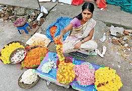 A flower vendor luring customers near Ernakulam North Railway Station Arun Angela