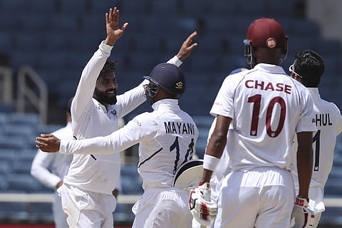 India's Ravindra Jadeja celebrates taking the wicket of West Indies' Roston Chase (Photo | AP)