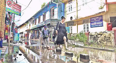 The waterlogged Synagogue Lane at Jew Town in Mattanchery is making it difficult for tourists to reach the Paradesi Synagogue located at the end of the street. According to shopkeepers, the issue has been prevalent for the past 15 years | Albin Mathew