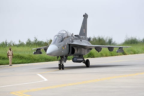 A Tejas aircraft carrying Union Defence Minister Rajnath Singh taxis towards the runway for flying on a sortie at HAL Airport in Bangalore on Thursday. | (Nagaraja Gadekal | EPS)