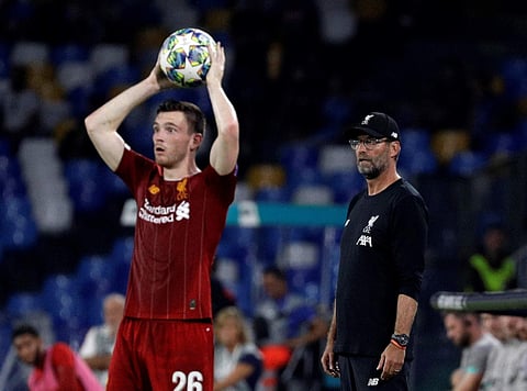 Liverpool manager Jurgen Klopp watches his players during the Champions League match against Napoli. (Photo | AP)