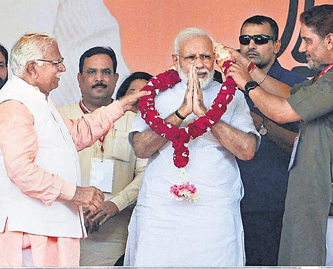 PM Narendra Modi has praised the work of Haryana CM Manohar Lal Khattar and asked the voters to give an outstanding mandate to the BJP | PTI