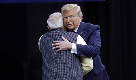 Prime Minister Narendra Modi and President Donald Trump embrace each other. (Photo | AP)