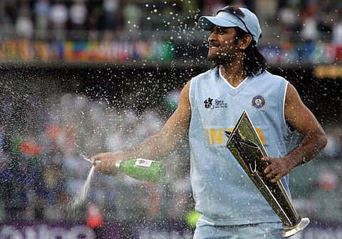 Indian cricket team captain Mahendra Singh Dhoni celebrates after defeating Pakistan in the Twenty20 championship final at the Wanderers Cricket Stadium in Johannesburg. (Photo | AFP)