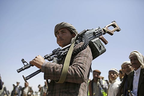 Houthi tribesman holds his weapon. (Photo | AP)