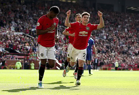 Manchester United celebrate a goal. | AP