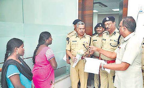 Santhi and Renuka greet top cop Dwaraka Tirumala Rao in Vijayawada I express
