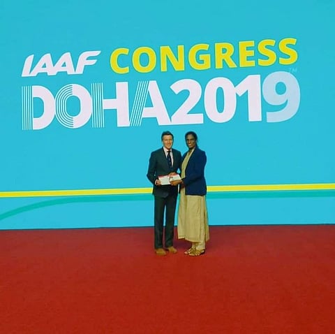 PT Usha receiving the award from IAAF President Sebastian Coe.
