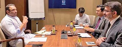 Industries, Commerce and IT Minister Mekapati Goutham Reddy meets various industrialists in Bengaluru on Tuesday I Express