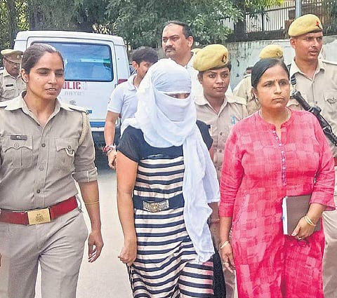 The law student, who accused BJP’s Chinmayanand of sexual misconduct and harassment, is taken to a court in Shahjahanpur on September 24.| ( Photo | PTI )