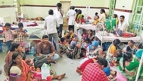 Parents and children crowd the floors of the paediatric ward in Niloufer Hospital due to lack of beds, (Left) A child rests on a broken seat outside a ward