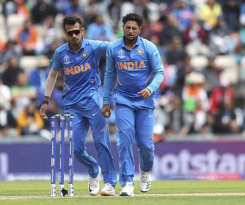 Kuldeep Yadav (R) with Yuzvendra Chahal (Photo | AP)