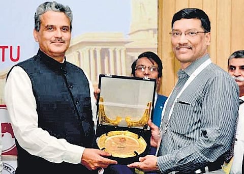 APSRTC Vice-Chairman and Managing Director NV Surendra Babu receiving the award in New Delhi on Tuesday | EXPRESS
