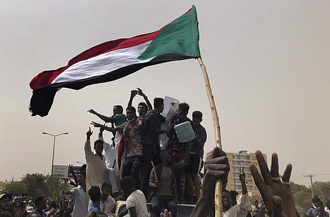 Sudanese protesters shout slogans as they march during a demonstration against the military council, in Khartoum, Sudan. (Photo | AP)