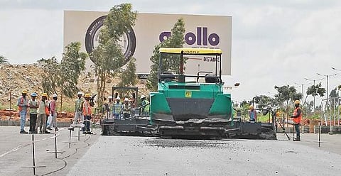 Plastic waste collected as part of BIAL’s ‘Plastic Beku’ campaign is used to lay roads at Kempegowda International Airport. (Photo | EPS)