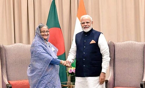 PM Modi greets Bangladesh PM Sheikh Hasina. (Photo | Twitter/@MEAIndia)