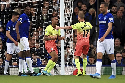 Manchester City's Gabriel Jesus, centre, celebrates scoring his side's first goal of the game against Everton. (Photo | AP)