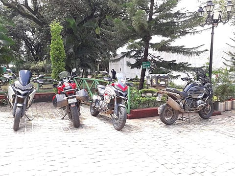 Picture of the high end mobikes parked outside the hotel where the murder happened in MP's Pachmarhi town. (Photo | EPS)