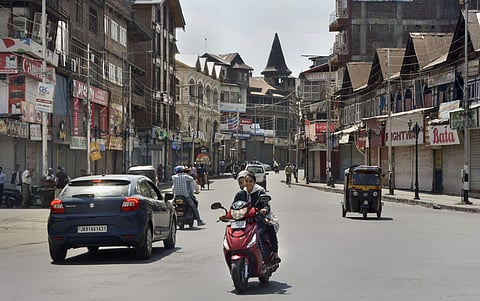 Commuters seen on a road near Lal Chowk on the 30th day of restriction after abrogration of the provisions of Article of 370 in Srinagar Tuesday September 3 2019. | PTI