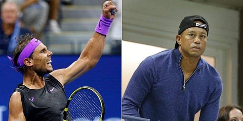 Rafael Nadal (L) celebrates as Tiger Woods looks on during the US Open fourth round clash. (Photo | AP)
